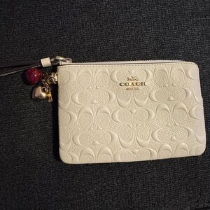 Coach Ivory Embossed Wristlet with Gold Accents